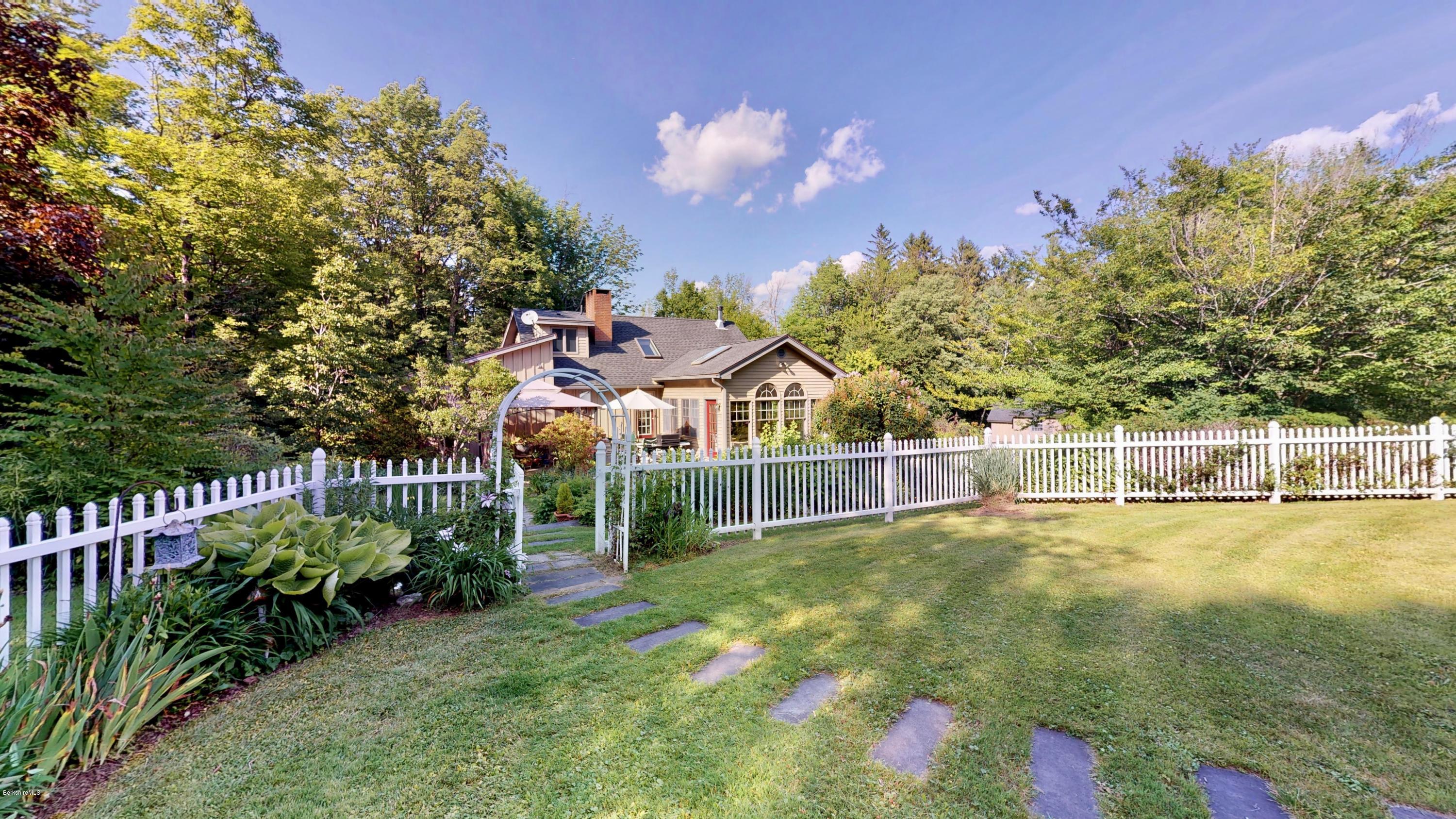 1016 High St Hill Road Windsor, MA 01270 - Photo 8 of 41 a view of a house with backyard and sitting area