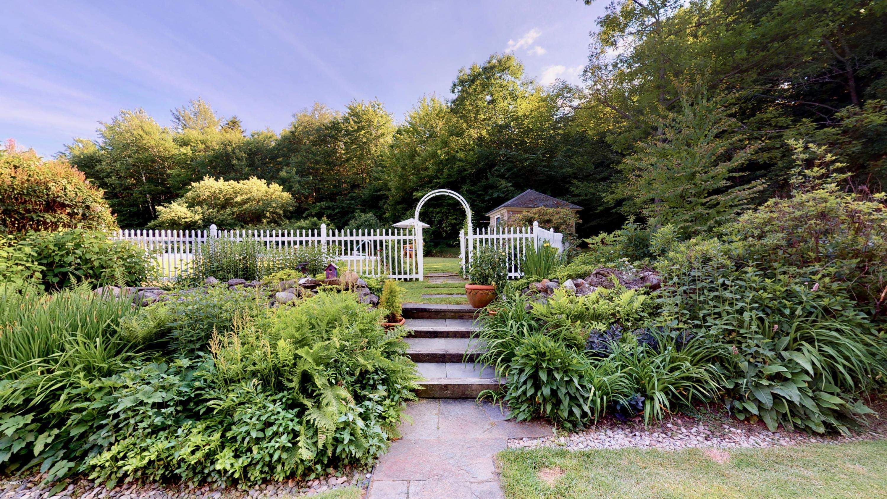 1016 High St Hill Road Windsor, MA 01270 - Photo 10 of 41 a front view of a house with garden