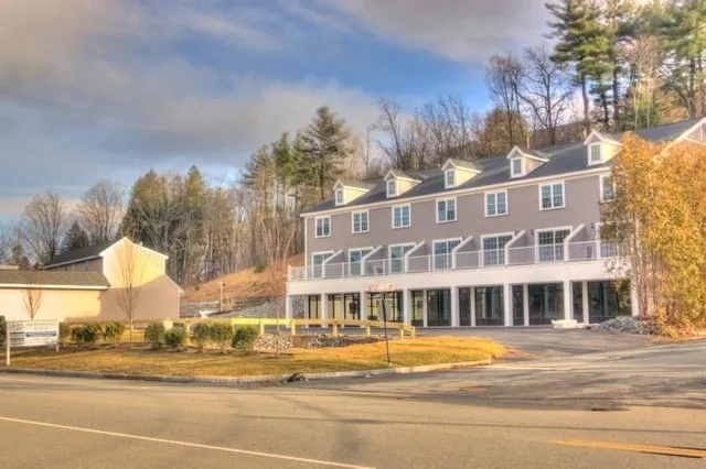 a view of a building with a street