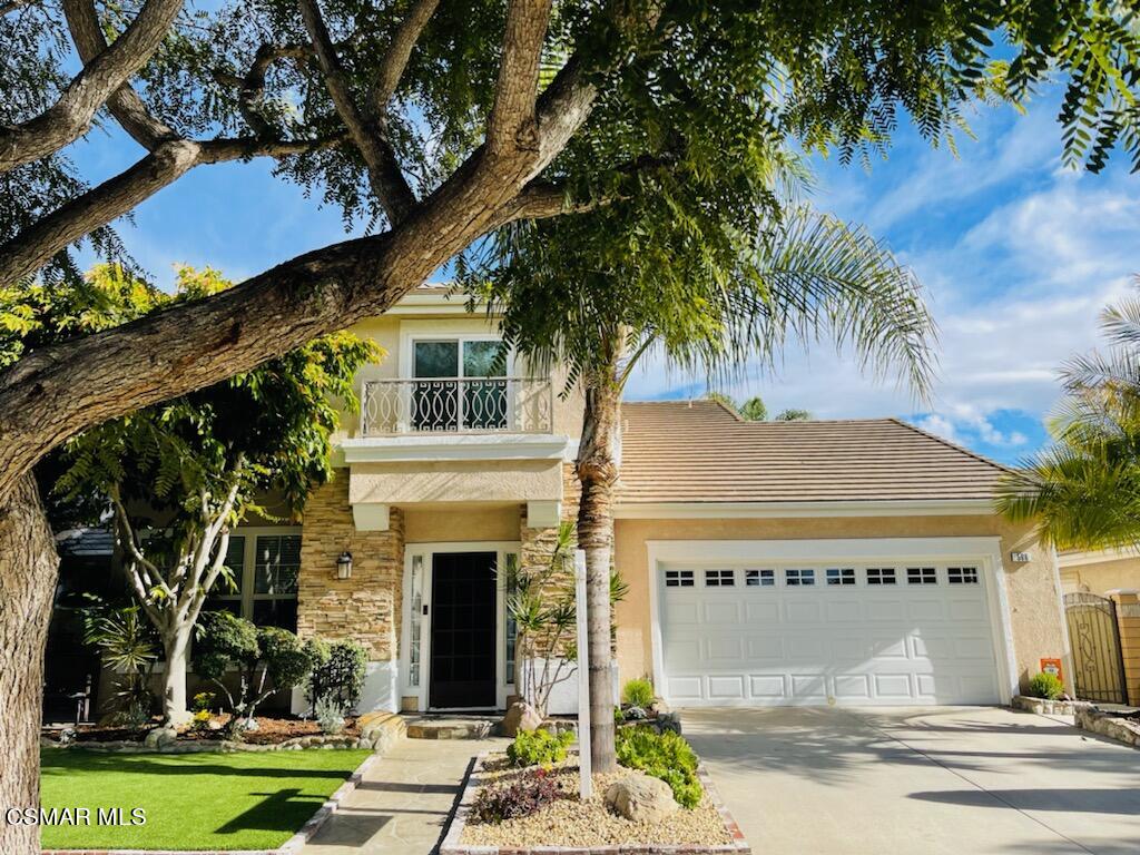 566 Princessa Drive Oxnard, CA 93030 - Photo 3 of 3 a front view of a house with garden