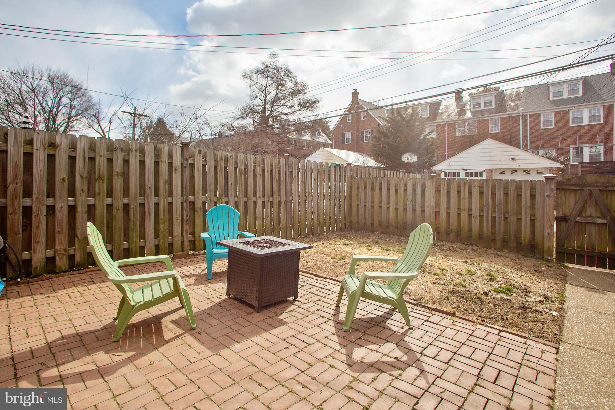 103 Murdock Road Baltimore, MD 21212 - Photo 33 of 41 Back Yard Patio with Privacy Fence & Parking Pad