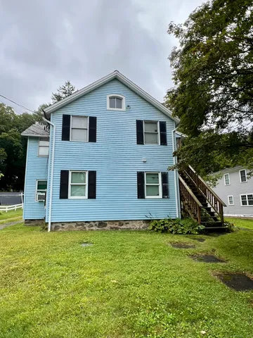 a house view with a garden space