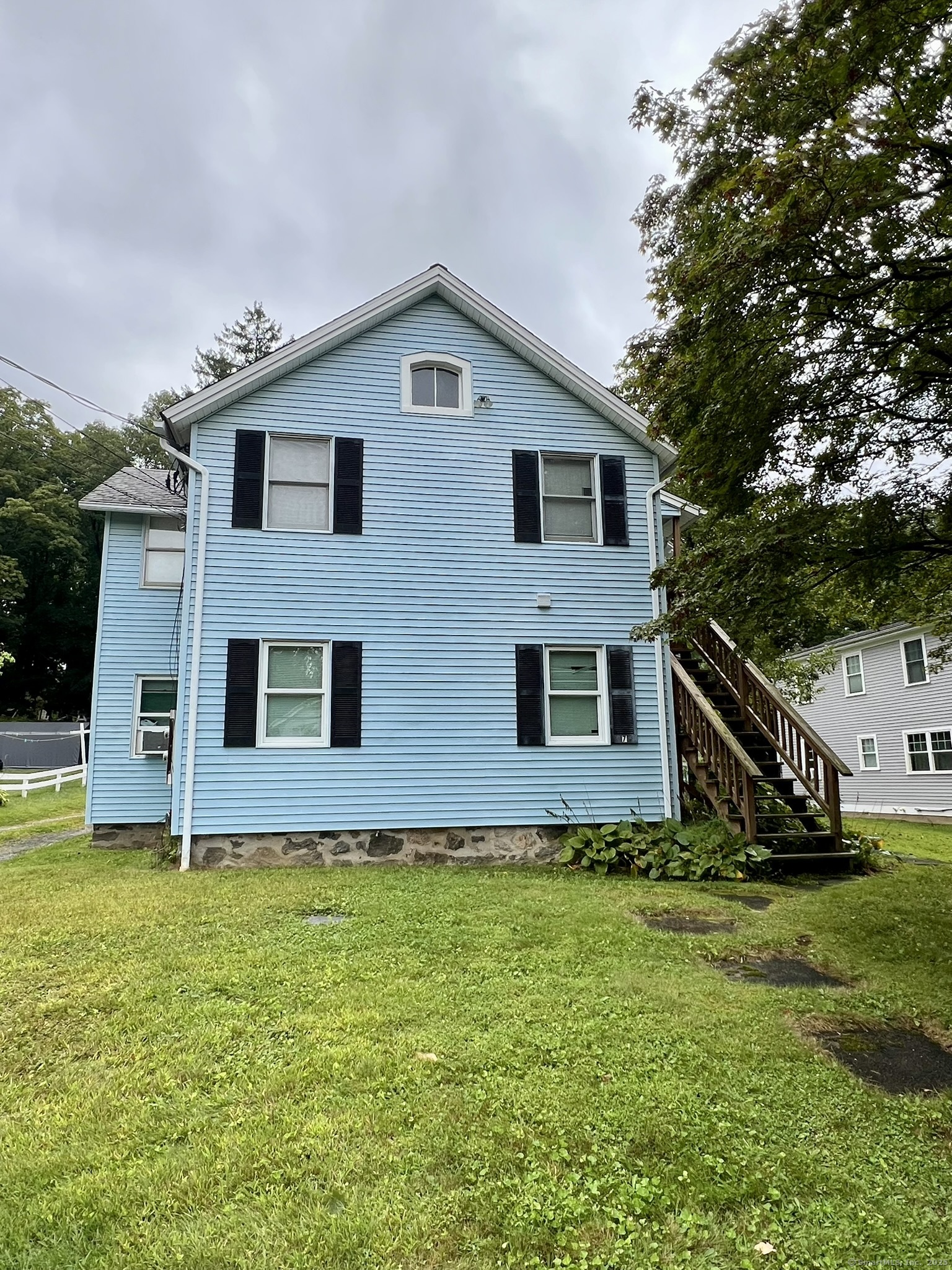 a house view with a garden space