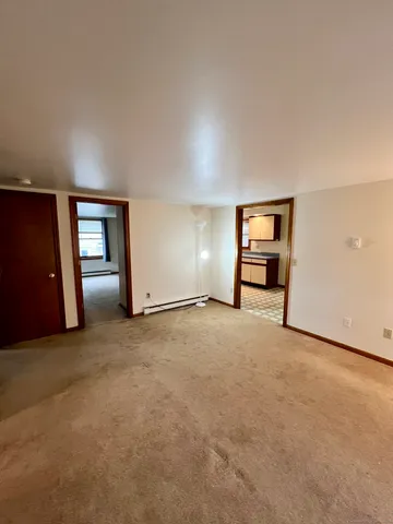 a bathroom with a tub and a shower
