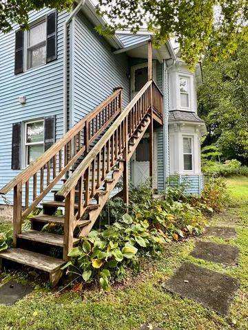 a view of a trees with a yard