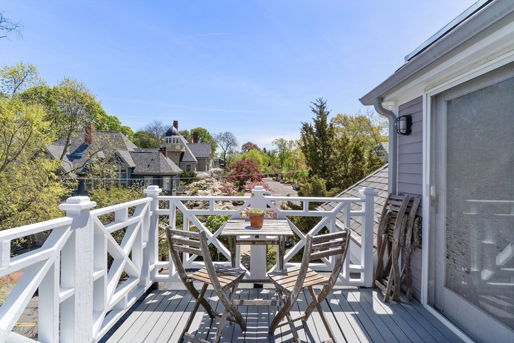 89 Upland Road, Unit 2 Cambridge, MA 02140 - Photo 8 of 17 a view of city from terrace with seating space