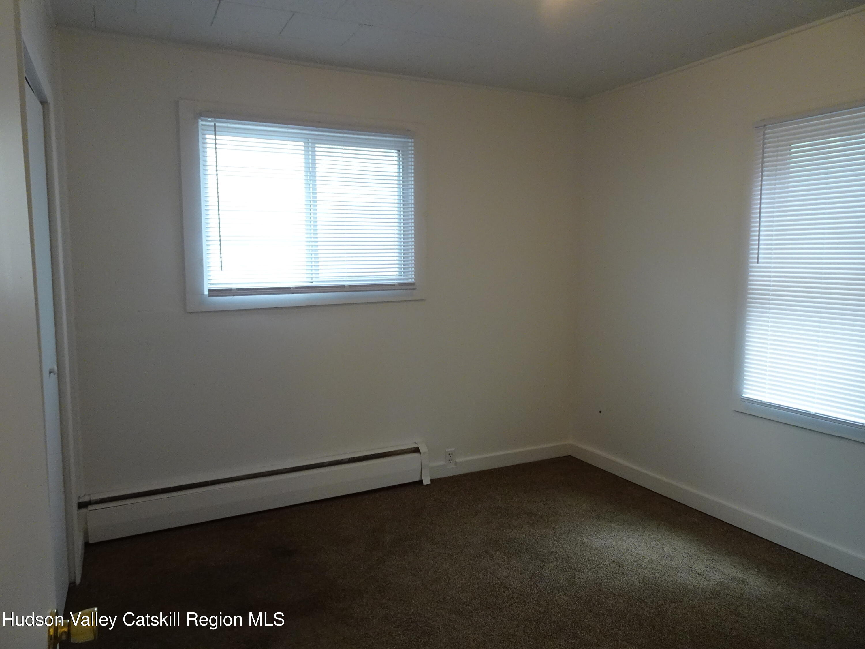 682 Highway 217 Hudson, NY 12534 - Photo 13 of 36 an empty room with a window