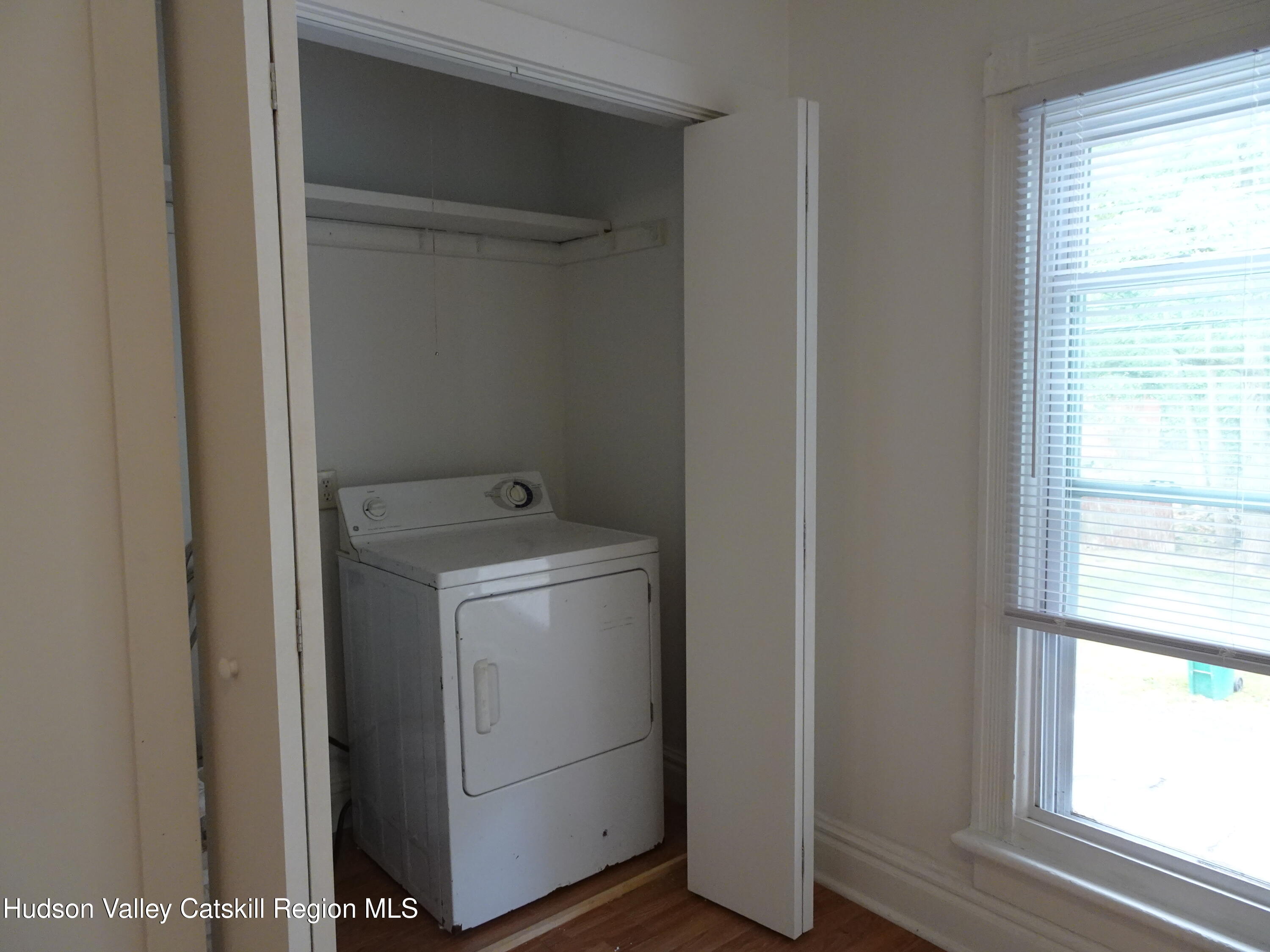 682 Highway 217 Hudson, NY 12534 - Photo 19 of 36 a utility room with dryer and washer