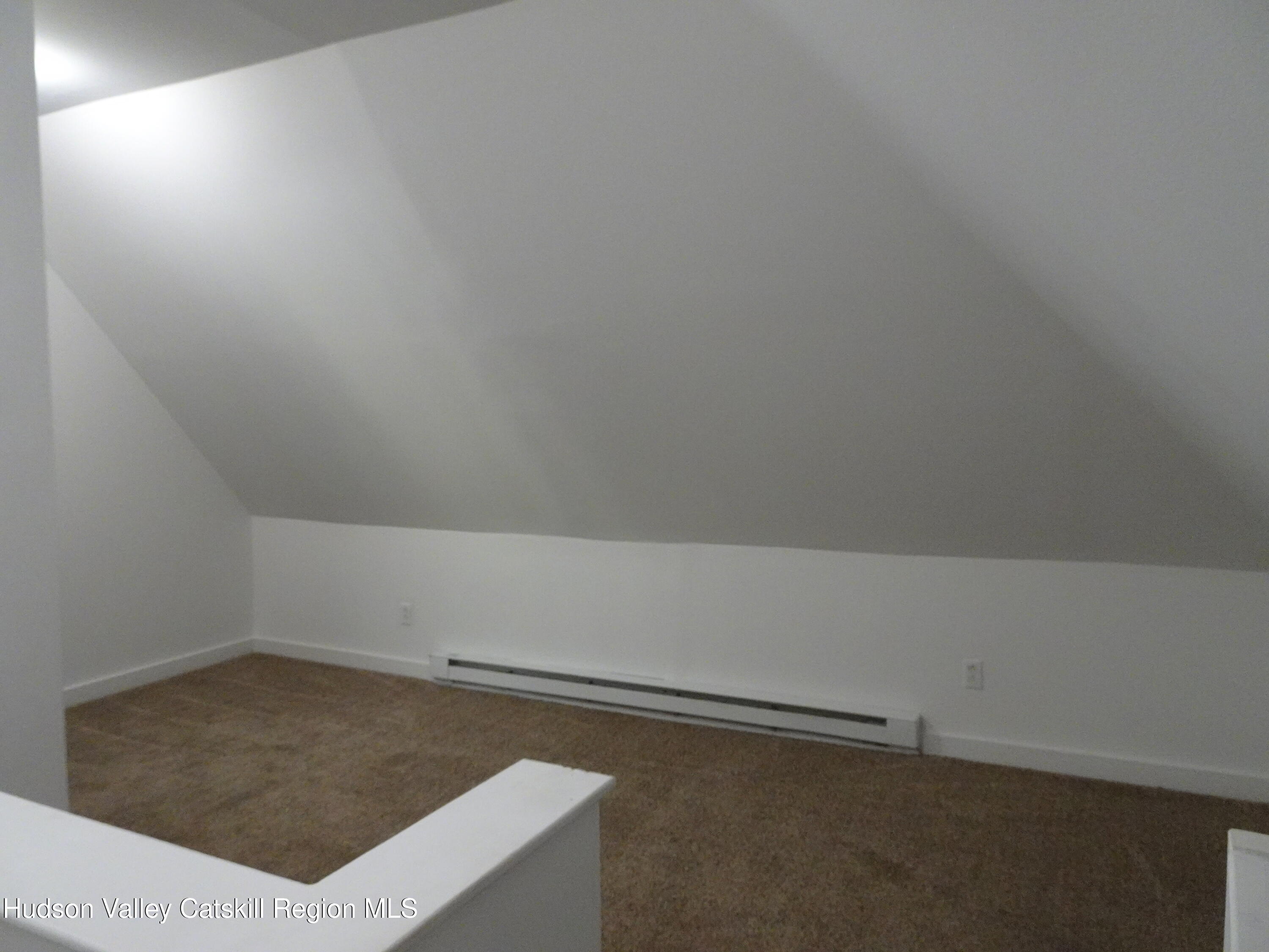 682 Highway 217 Hudson, NY 12534 - Photo 24 of 36 an empty room with an empty space