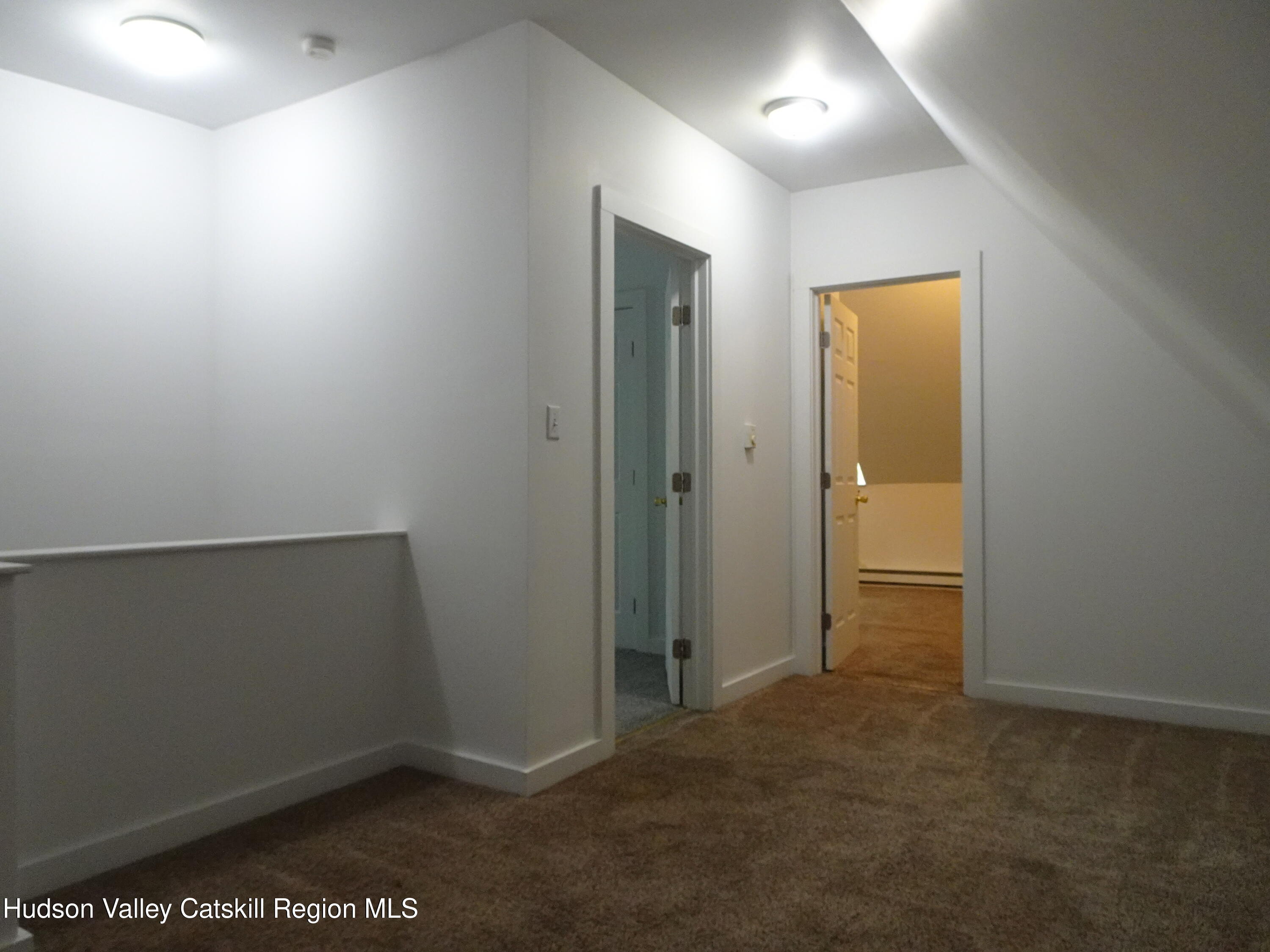 682 Highway 217 Hudson, NY 12534 - Photo 26 of 36 an empty room with closet area