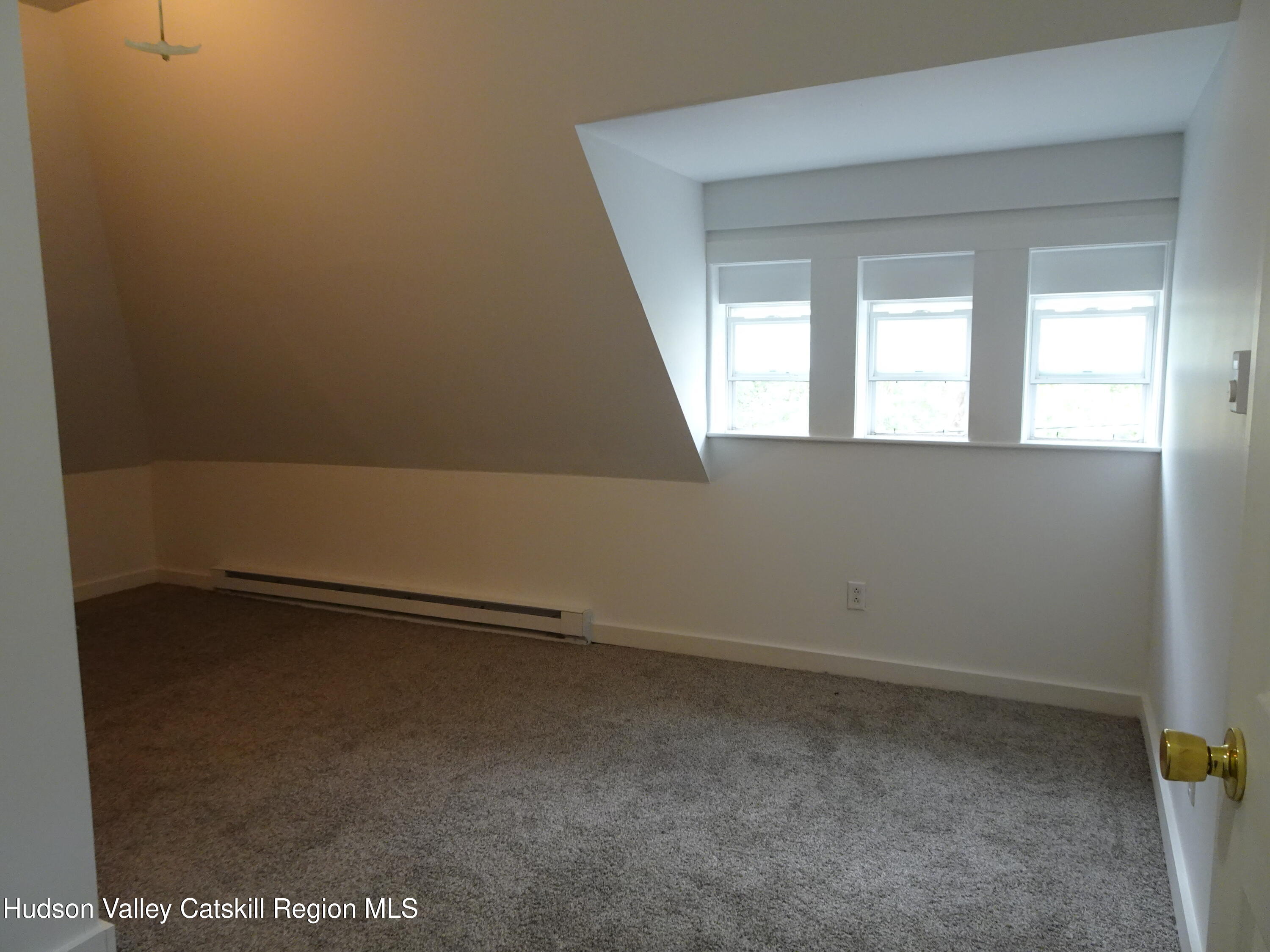 682 Highway 217 Hudson, NY 12534 - Photo 27 of 36 a view of an empty room with a window