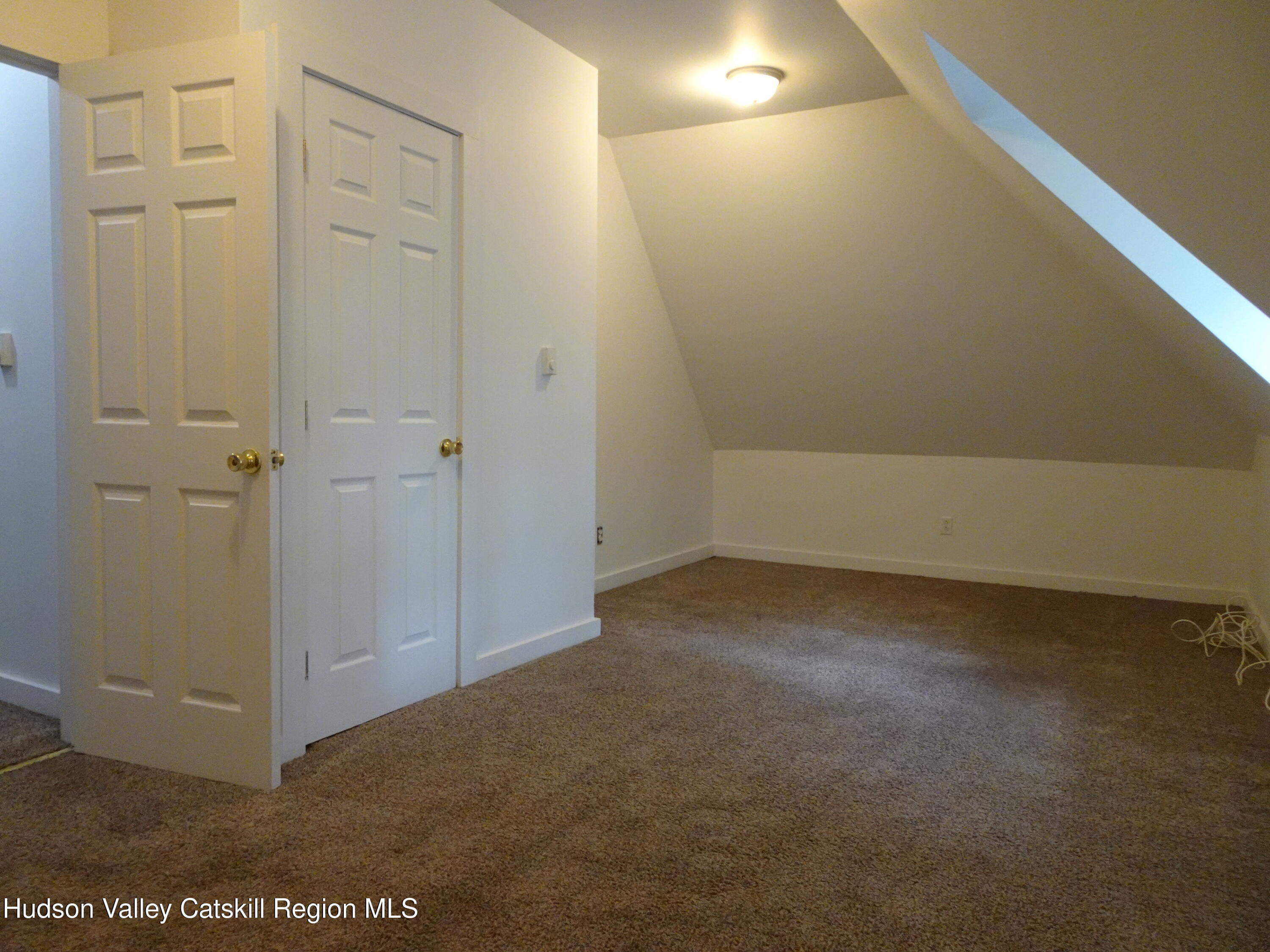 682 Highway 217 Hudson, NY 12534 - Photo 30 of 36 an empty room with an entryway