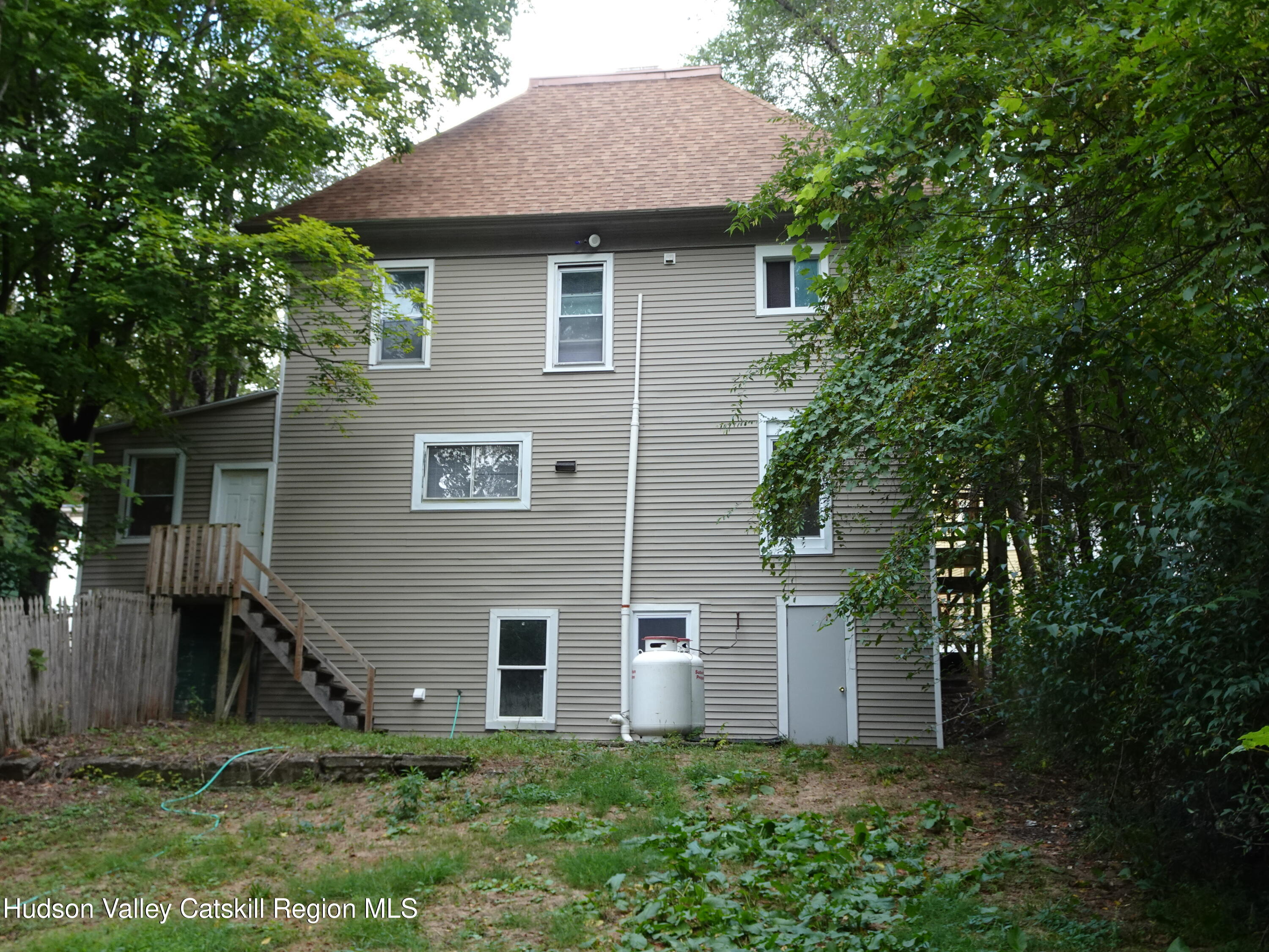 682 Highway 217 Hudson, NY 12534 - Photo 32 of 36 a front view of house with a garden