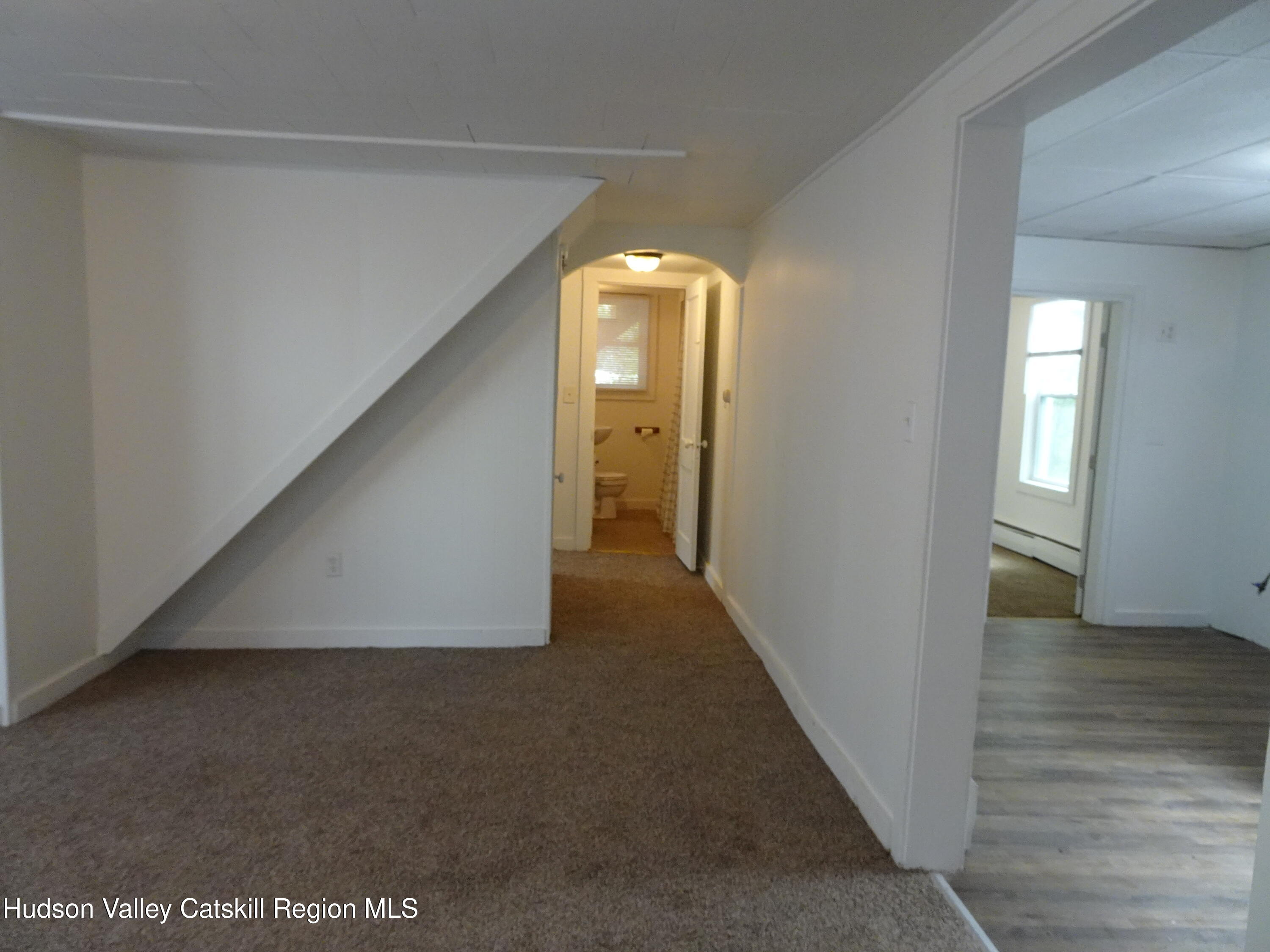 682 Highway 217 Hudson, NY 12534 - Photo 9 of 36 a view of a hallway with wooden floor