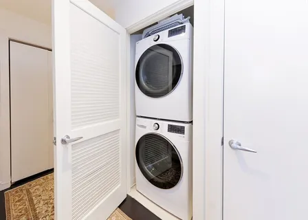 a view of a living room with furniture