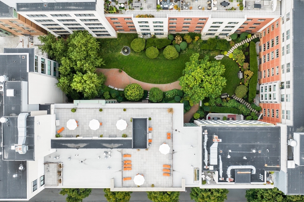 29 Otis Street, Unit 407 Cambridge, MA 02141 - Photo 26 of 31 an aerial view of multiple houses with outdoor space