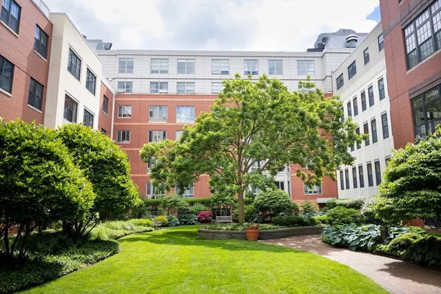 a view of a building with a yard