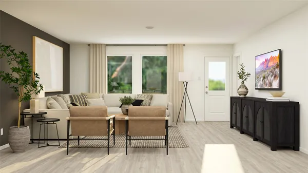 a living room with furniture and a large window