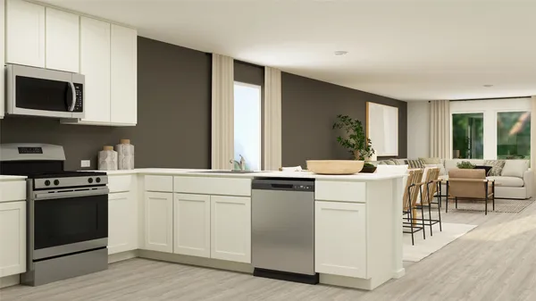 a kitchen with white cabinets stainless steel appliances and sink