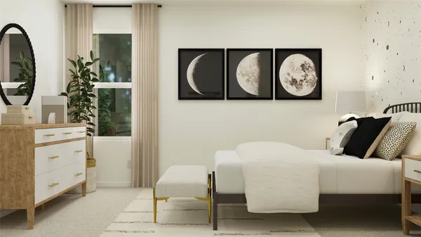 a bedroom with a bed and painting on the wall