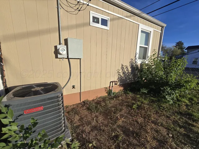 a house view with a backyard space