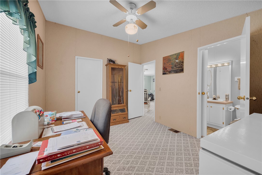 721 Cedar Crest Trail Walhalla, SC 29691 - Photo 30 of 47 A quiet retreat, this bedroom offers carpeted flooring and a convenient ceiling fan for comfort.
