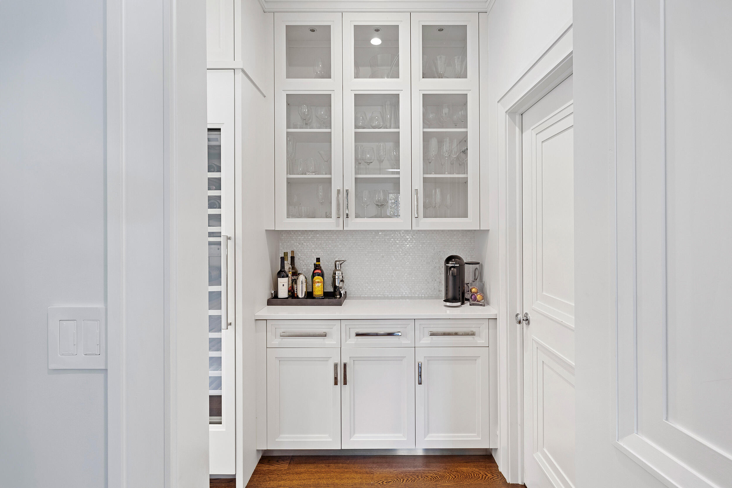 549 Oenoke Ridge New Canaan, CT 06840 - Photo 14 of 54 a view of cabinets with wooden floor