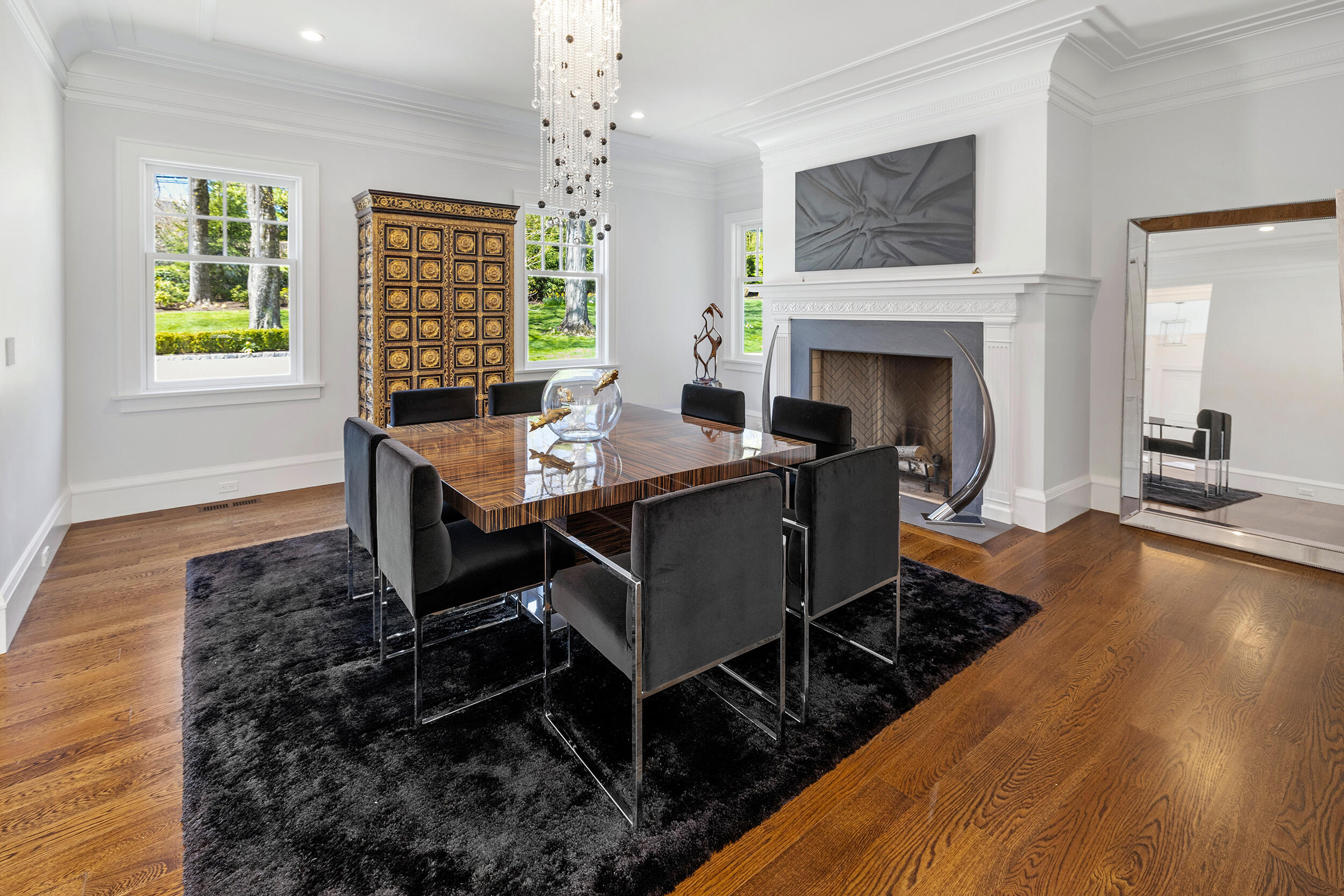 549 Oenoke Ridge New Canaan, CT 06840 - Photo 15 of 54 a view of a dining room with furniture window and wooden floor