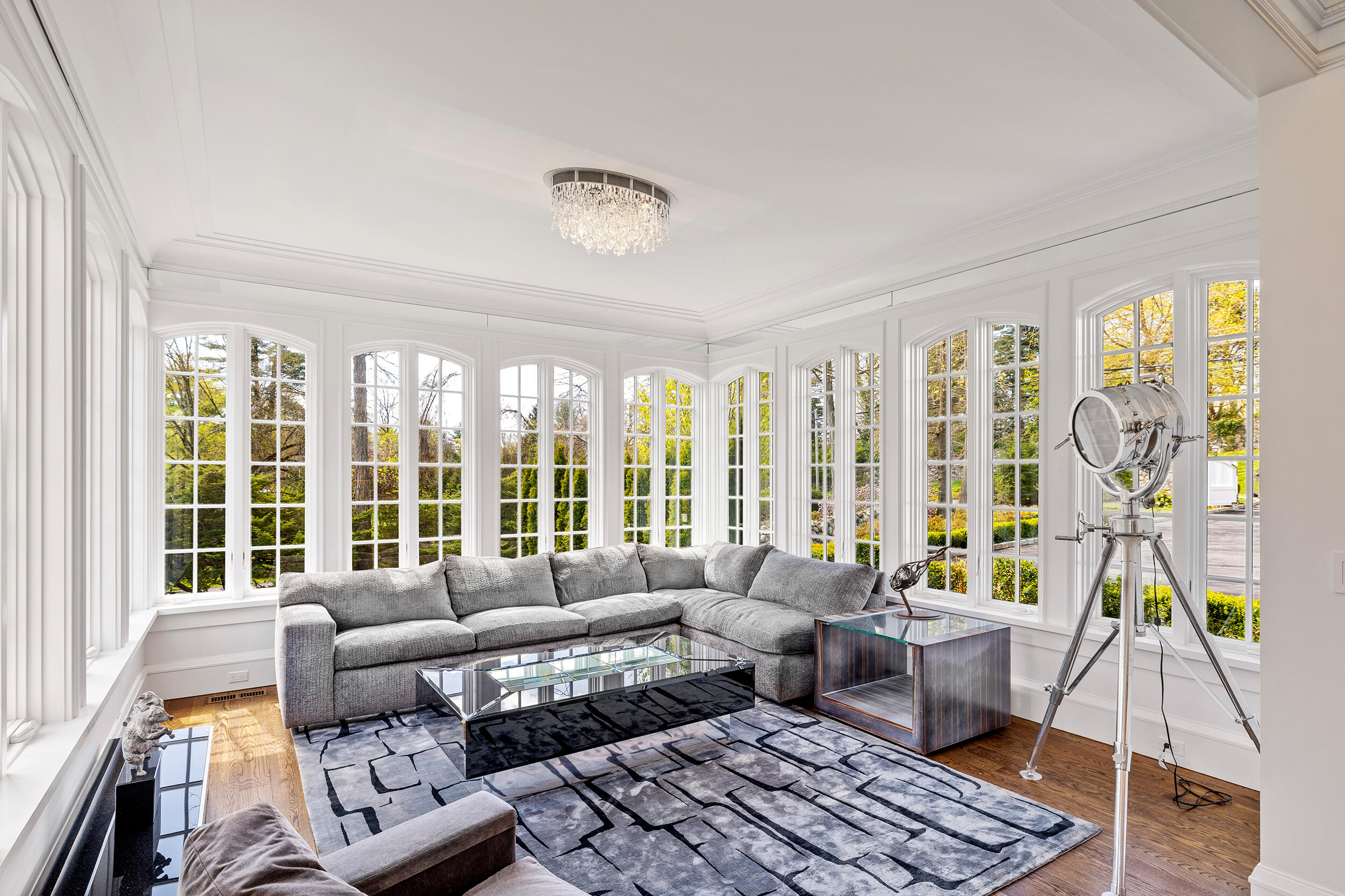 549 Oenoke Ridge New Canaan, CT 06840 - Photo 16 of 54 a living room with furniture and a large window