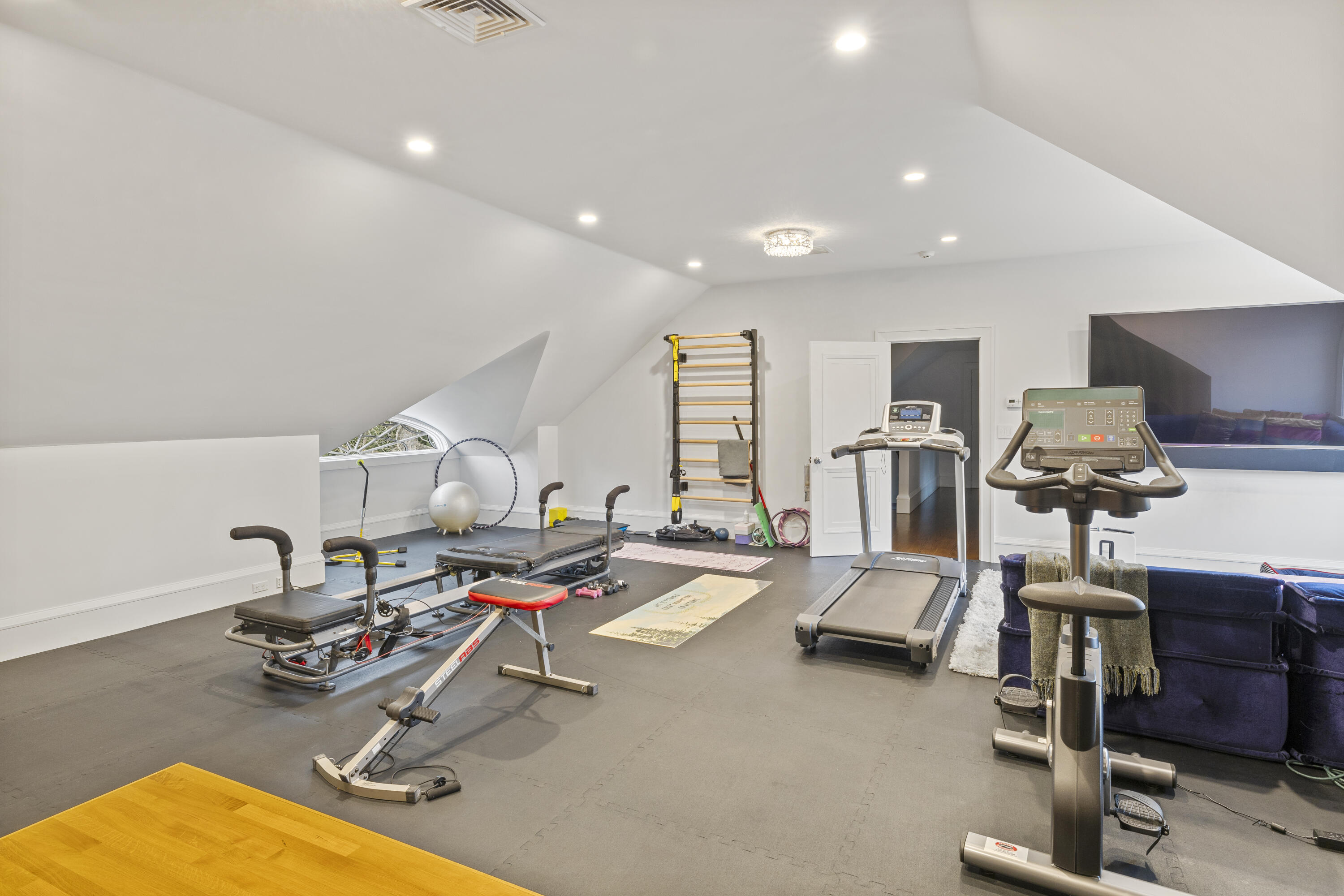 549 Oenoke Ridge New Canaan, CT 06840 - Photo 33 of 54 a view of a room with gym equipment