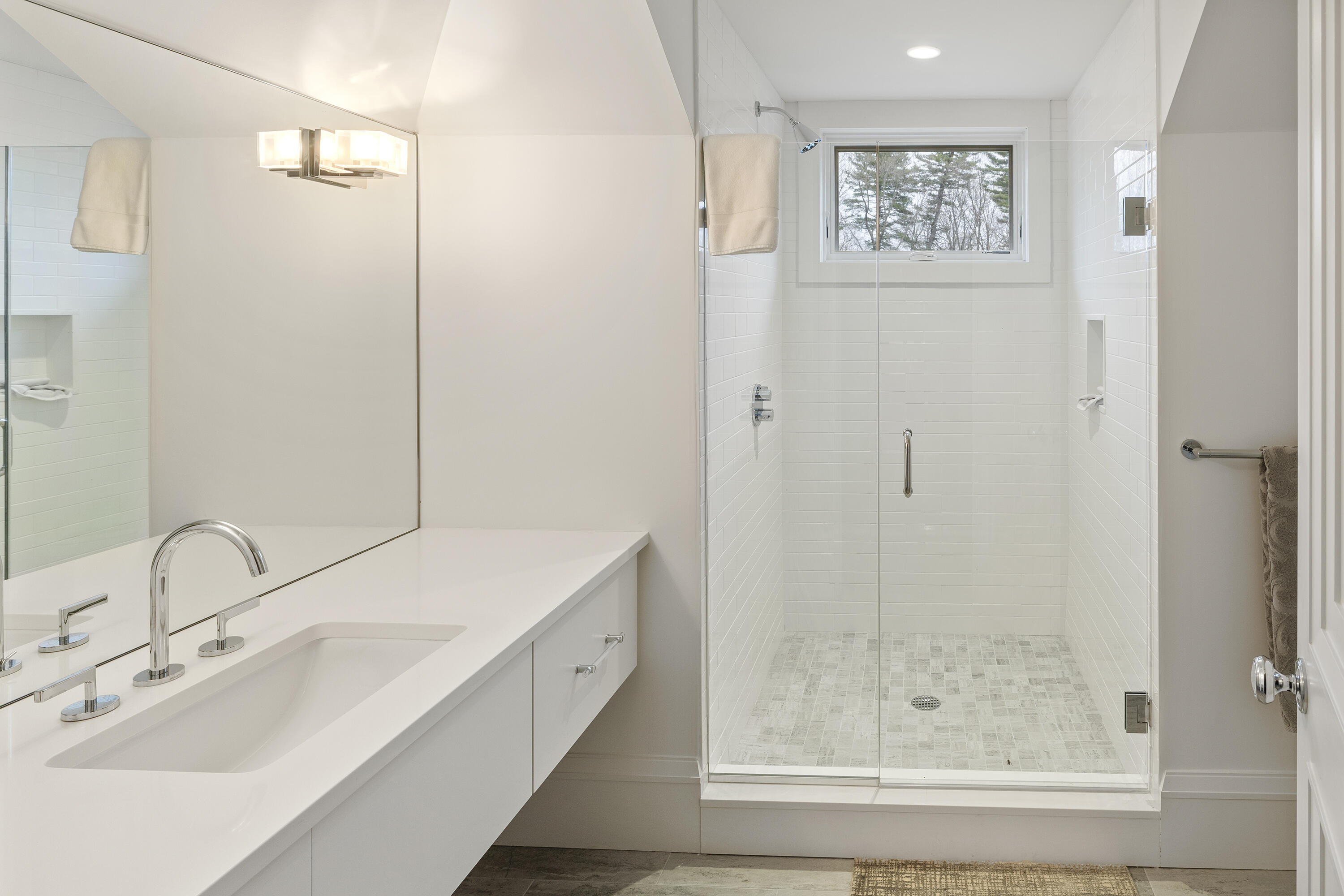 549 Oenoke Ridge New Canaan, CT 06840 - Photo 34 of 54 a bathroom with a bathtub and a sink