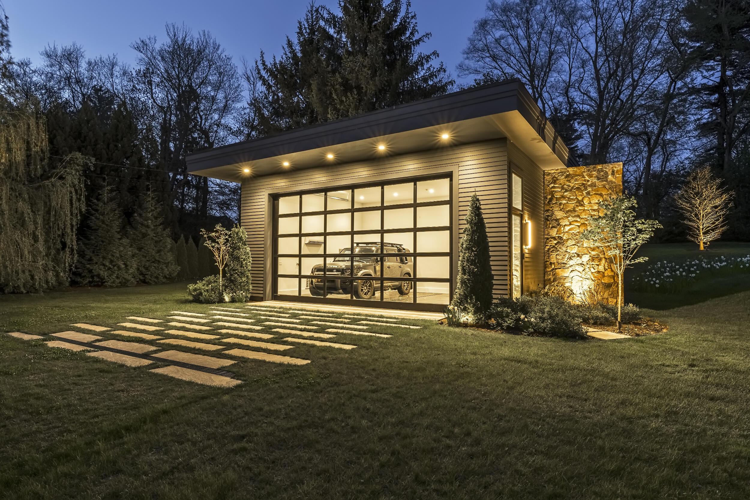 549 Oenoke Ridge New Canaan, CT 06840 - Photo 48 of 54 a front view of a house with a yard