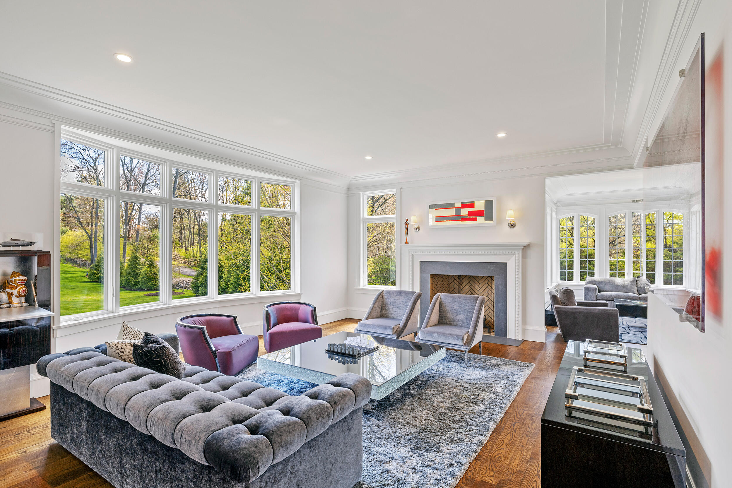 549 Oenoke Ridge New Canaan, CT 06840 - Photo 6 of 54 a living room with furniture large window and a fireplace