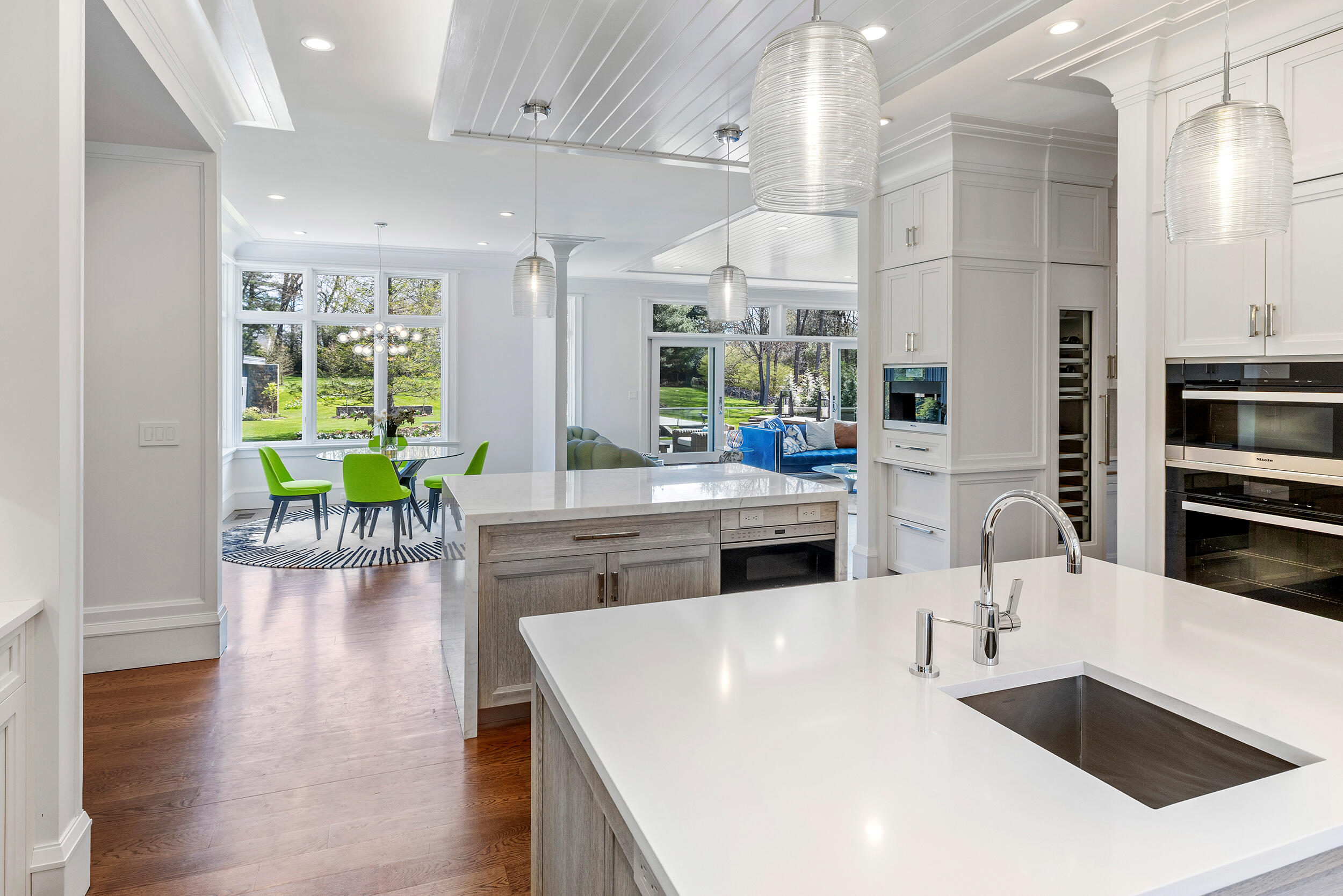 549 Oenoke Ridge New Canaan, CT 06840 - Photo 10 of 54 a kitchen with counter top space and stainless steel appliances