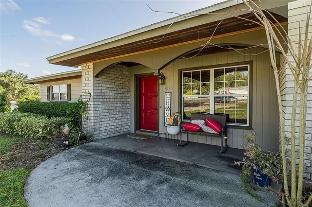 a front view of house with an outdoor space