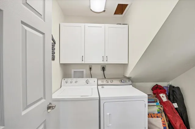 a view of a chairs and table on the wooden floor