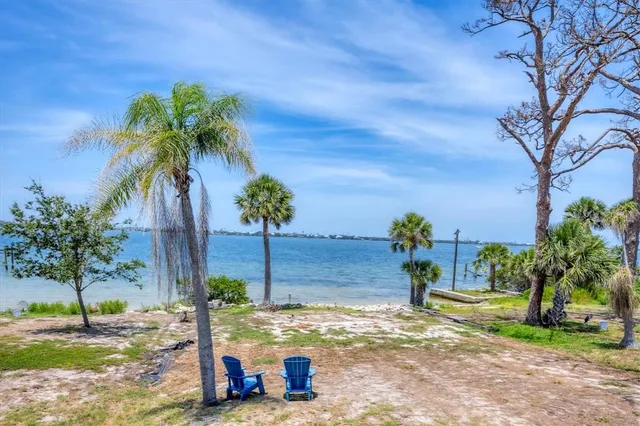 a view of a yard with furniture
