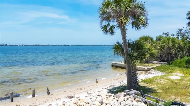 a view of a lake with a beach