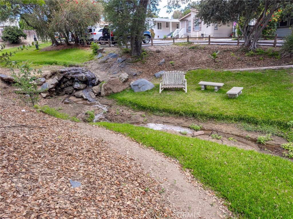 3909 Reche Road, Unit 127 Fallbrook, CA 92028 - Photo 59 of 62 Stream by the clubhouse