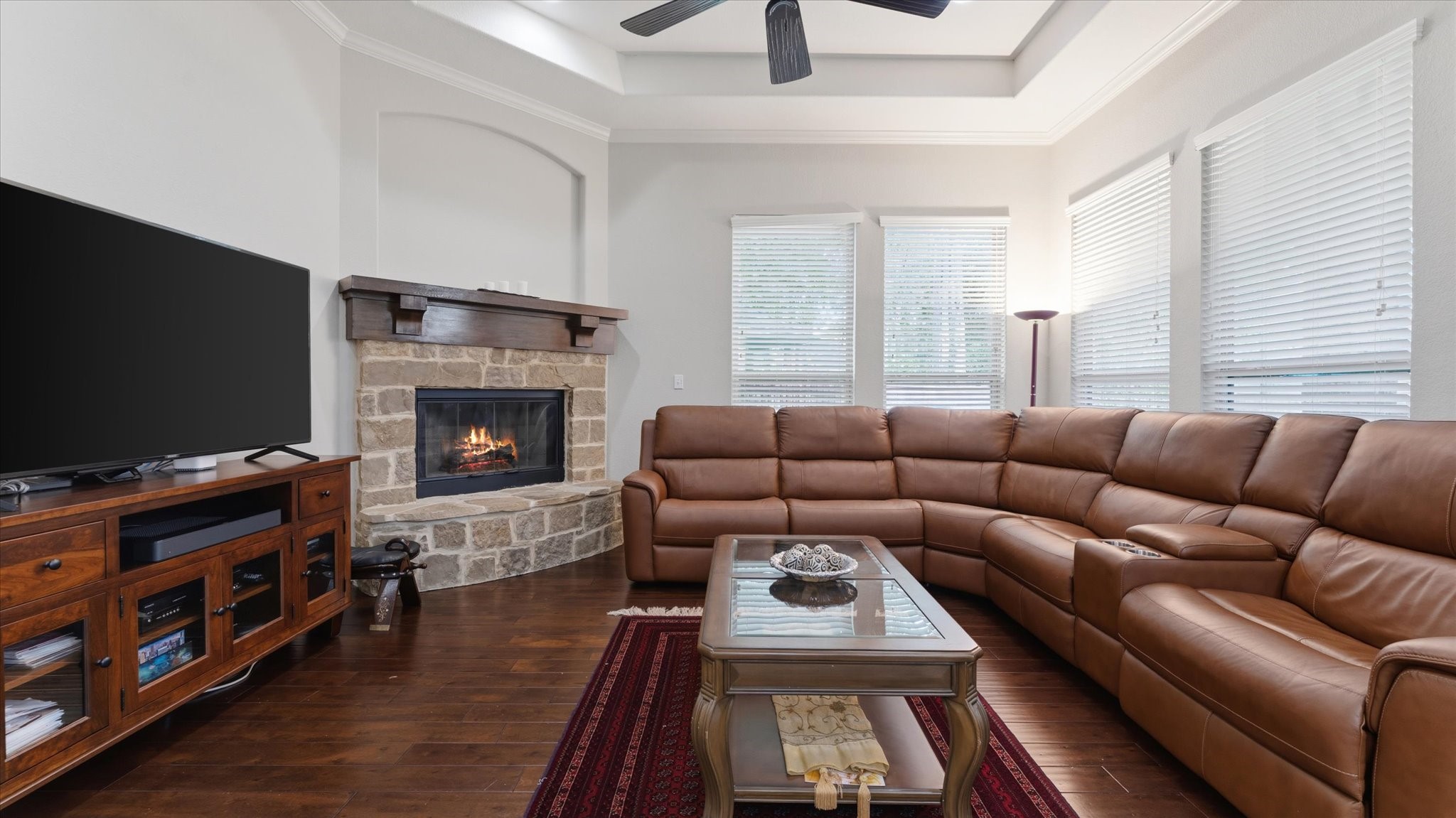 14 Painted Post Place Spring, TX 77389 - Photo 14 of 43 a living room with furniture and a flat screen tv