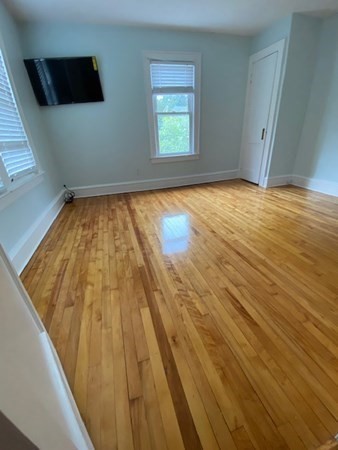 18 Maple Road Longmeadow, MA 01106 - Photo 17 of 26 a view of empty room with wooden floor