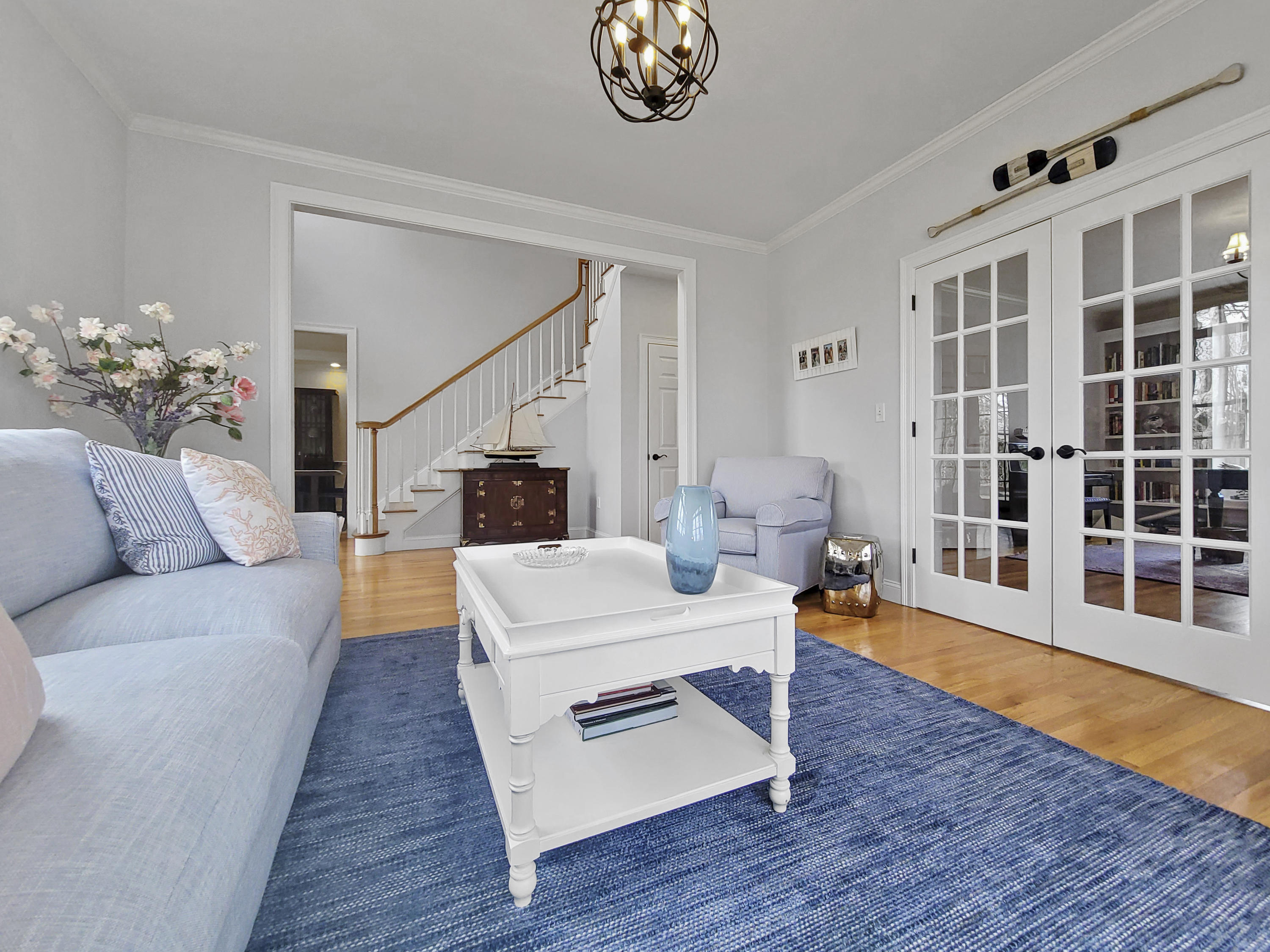 215 Cairn Ridge Road East Falmouth, MA 02536 - Photo 11 of 60 a living room with furniture and a wooden floor