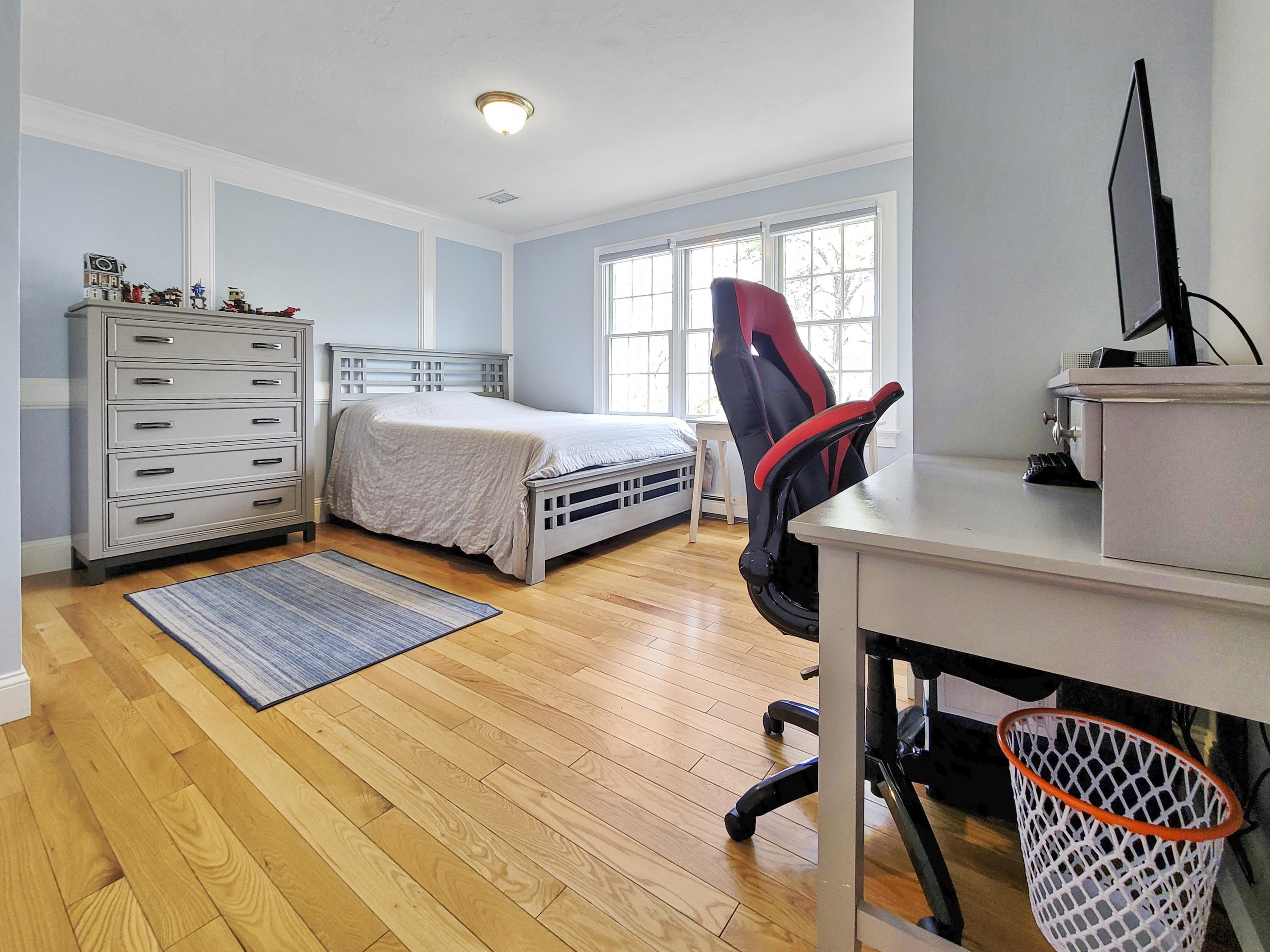 215 Cairn Ridge Road East Falmouth, MA 02536 - Photo 33 of 60 a bedroom with a bed and furniture