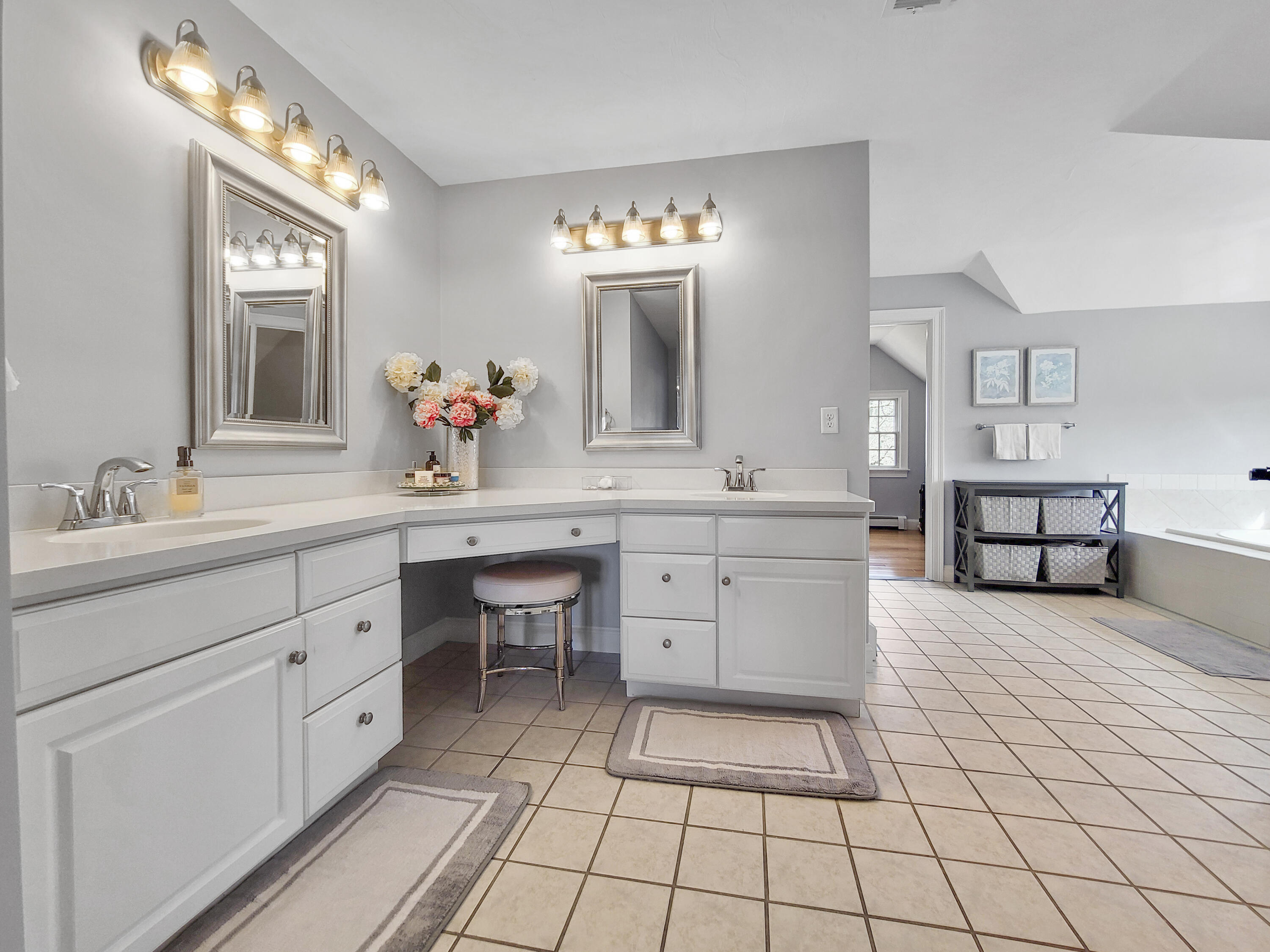 215 Cairn Ridge Road East Falmouth, MA 02536 - Photo 39 of 60 a spacious bathroom with a double vanity sink mirror and bathtub