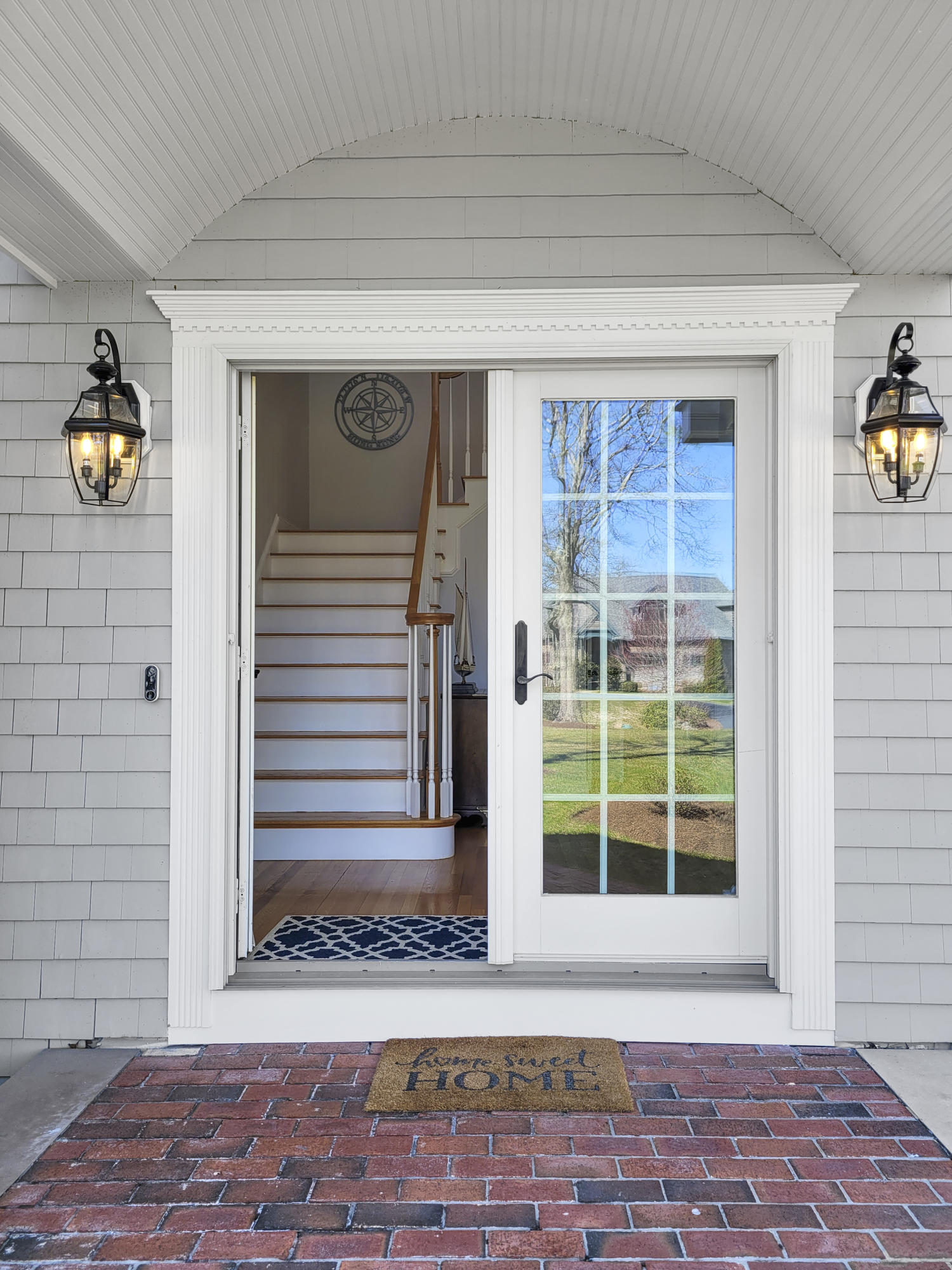 215 Cairn Ridge Road East Falmouth, MA 02536 - Photo 4 of 60 a front view of a house with porch