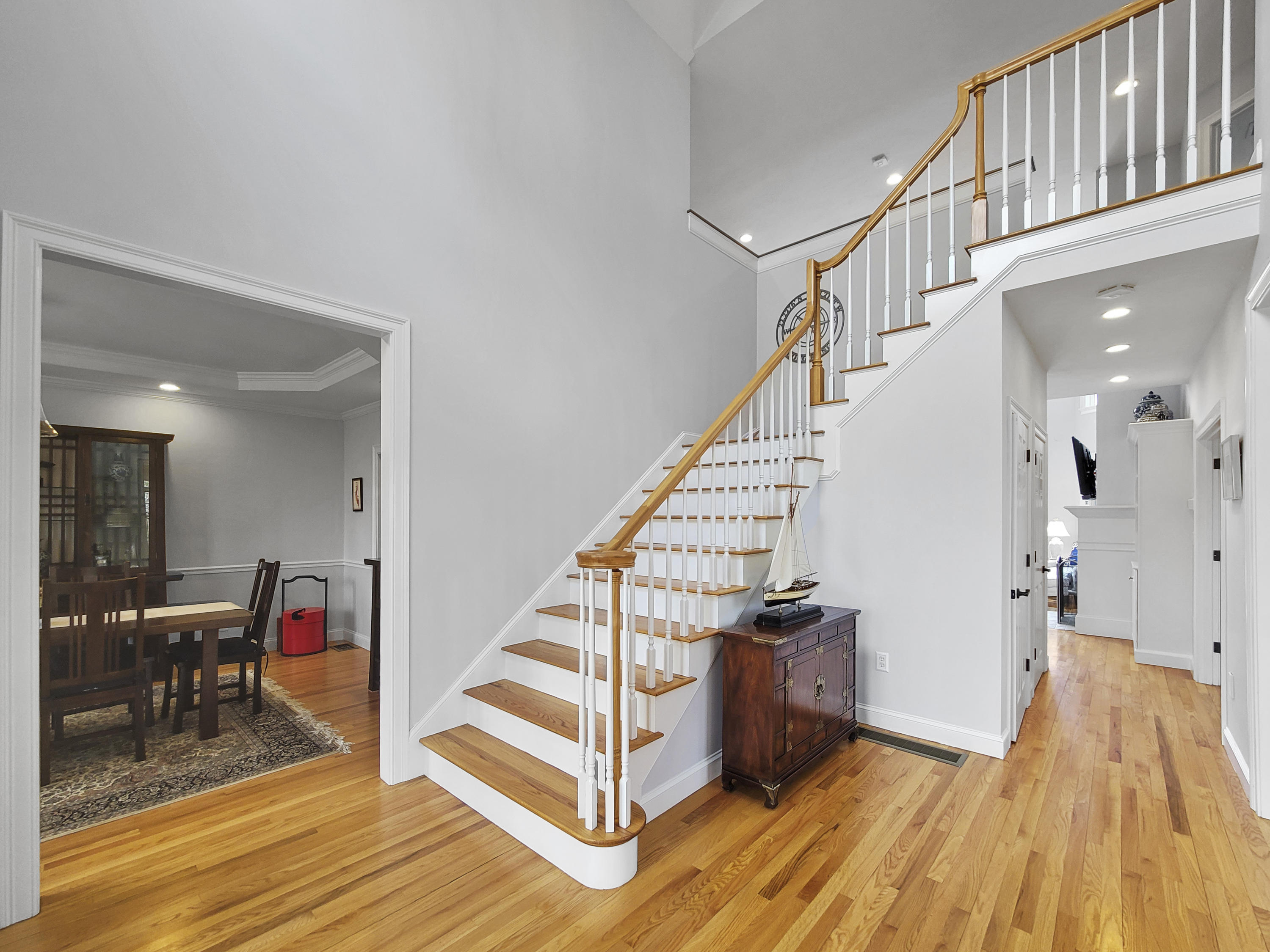 215 Cairn Ridge Road East Falmouth, MA 02536 - Photo 5 of 60 a view of entryway and hall with wooden floor