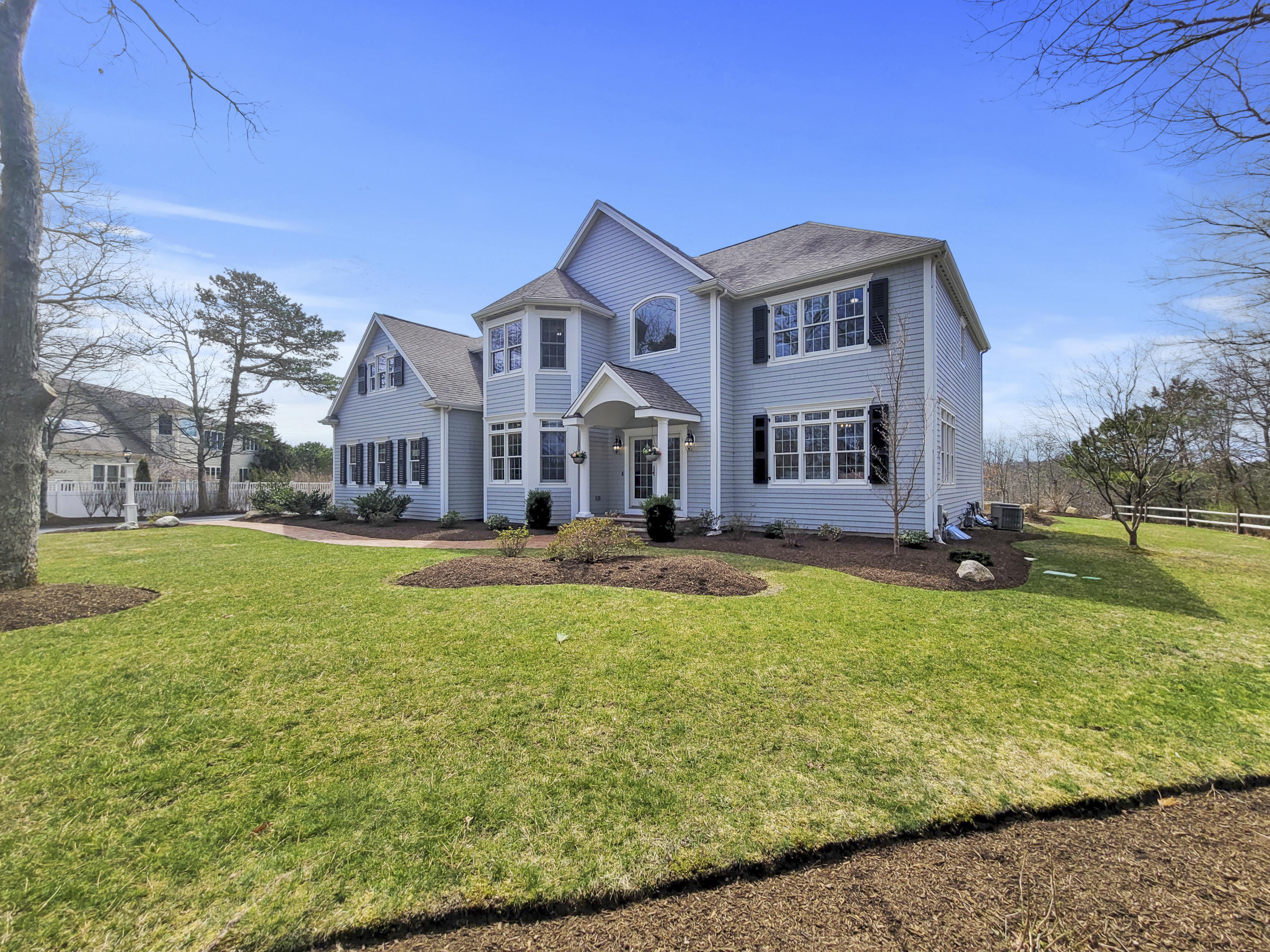 215 Cairn Ridge Road East Falmouth, MA 02536 - Photo 54 of 60 a view of a house with a swimming pool