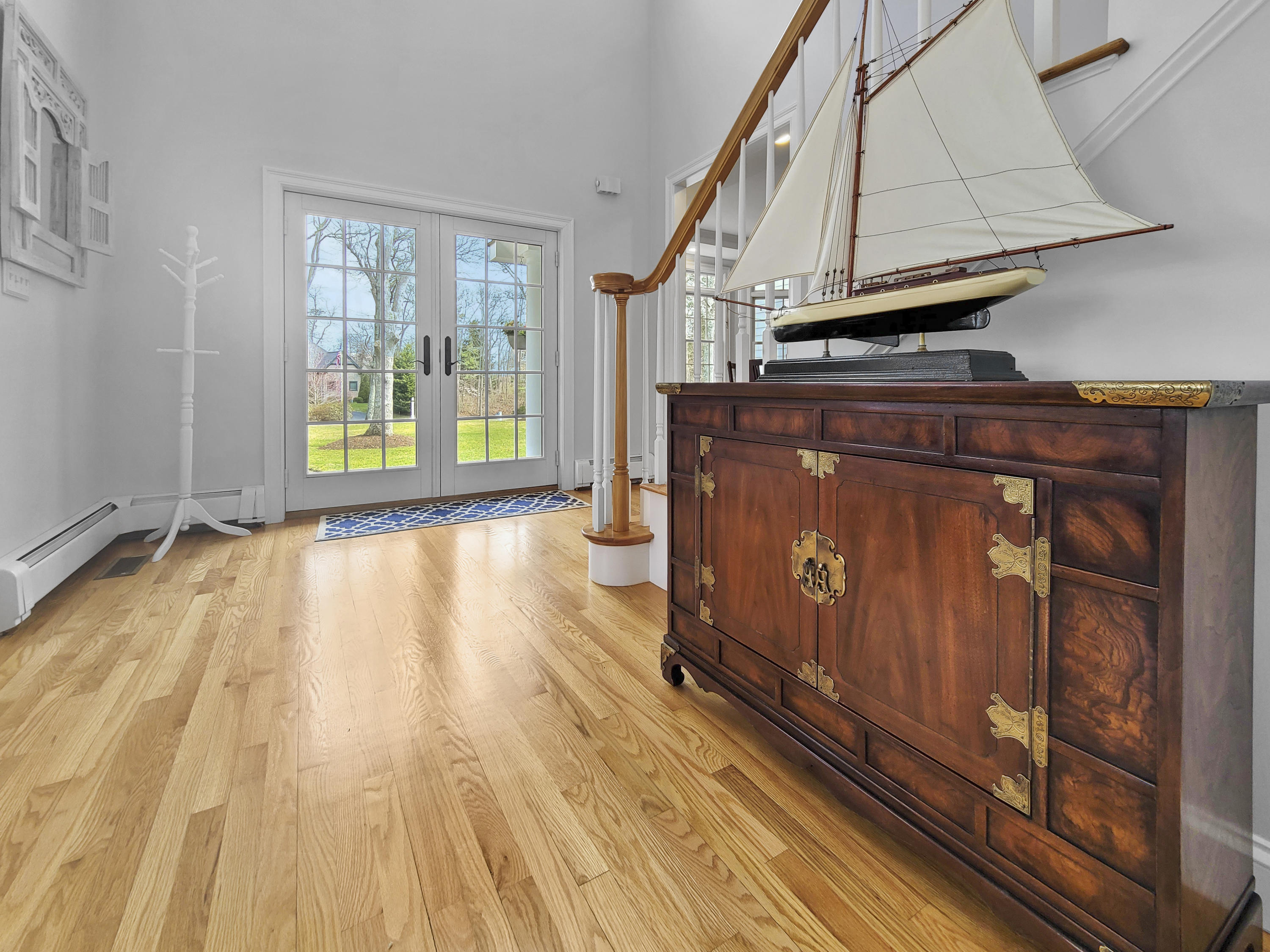 215 Cairn Ridge Road East Falmouth, MA 02536 - Photo 9 of 60 a view of front door with wooden floor