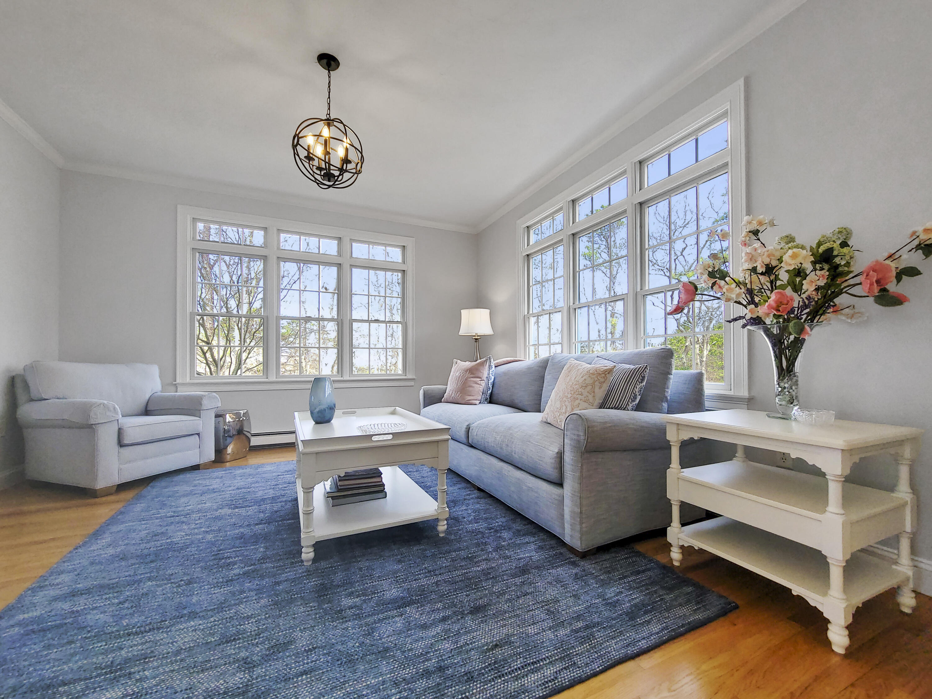 215 Cairn Ridge Road East Falmouth, MA 02536 - Photo 10 of 60 a living room with furniture and a large window