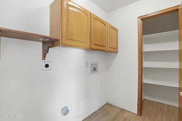 a bathroom with a sink a mirror and a toilet